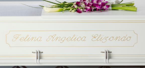 Personalized casket exterior with monogram detail name etched on the side